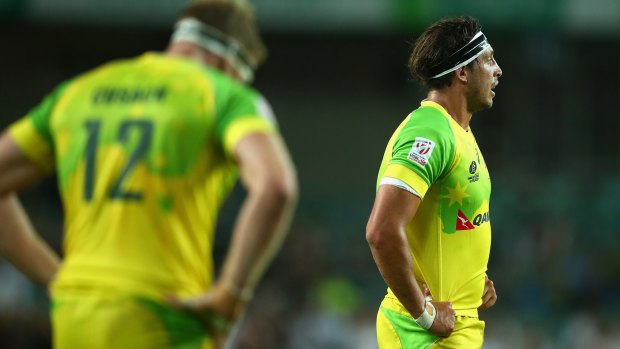 Dramatic draw: Australia's Tom Cusack and Sam Myers looked forlorn figures following their final seconds draw against New Zealand.