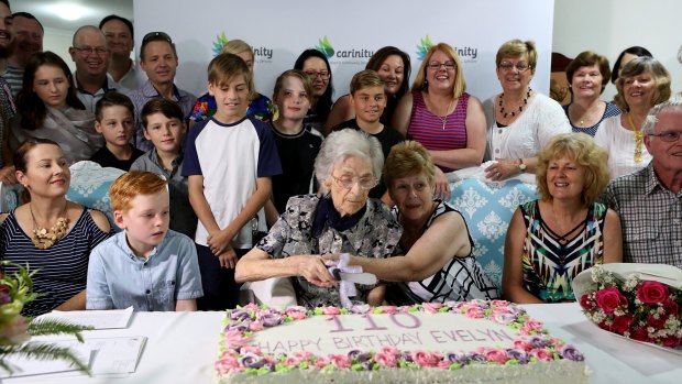 Queensland's oldest living citizen, Evelyn Vigor, surrounded by family as she turns 110 at Wooloowin.