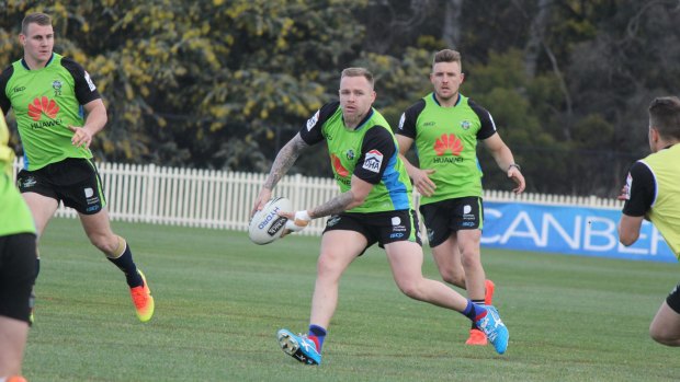 Canberra Raiders five-eighth Blake Austin trains with his hand bandaged.