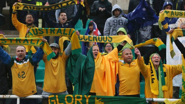 Australia's soccer fans braved the rain in Tehran on Thursday.