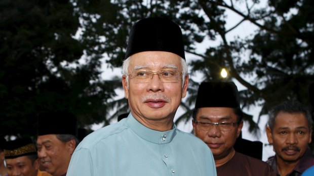 Malaysia's Prime Minister Najib Razak arrives to break fast at Saujana Menteri Besar in Malaysia's southern state of Johor on Friday.