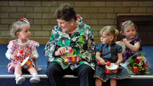 Joan Kirner at Sunbury Neighbourhood House in 2012 with members of the Mini Maestros.