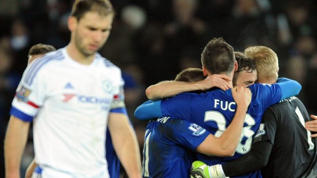 Leicester's players celebrate after beating Chelsea 2-1.