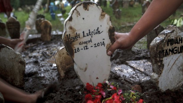 The grave marker of Hayati Lutfiah Hamid, the first crash victim to have a funeral.