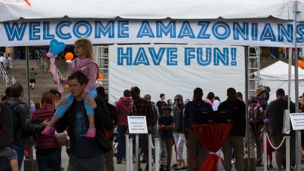 Family friendly? ... Amazon employees arrive at a company picnic at CenturyLink Field in Seattle,