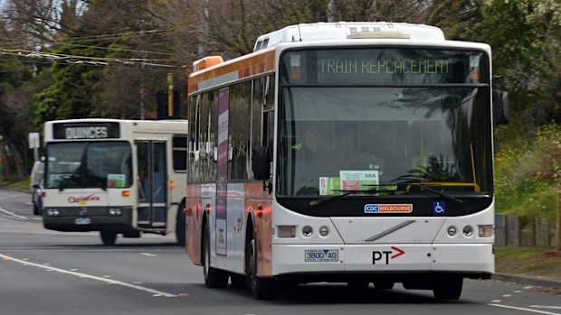 A replacement bus leaving Caulfield station on Friday. 