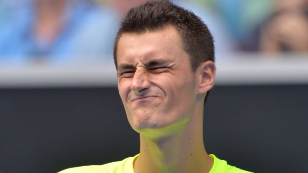 Tame exit: Bernard Tomic reacts during his match against Tomas Berdych.