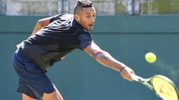 Limbering up: Nick Kyrgios practises on Monday ahead of Australia's David Cup play-off against Slovakia. 