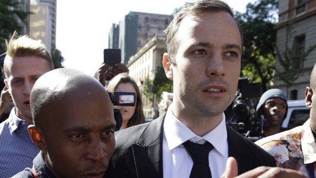 Oscar Pistorius leaves the High Court in Pretoria on Monday.