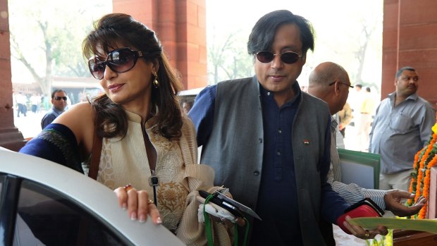 In this photo from 2012, Shashi Tharoor and his late wife, Sunanda Pushkar, arrive at parliament.
