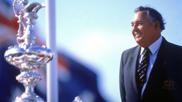 Alan Bond with the America's Cup sailing trophy in 1993.