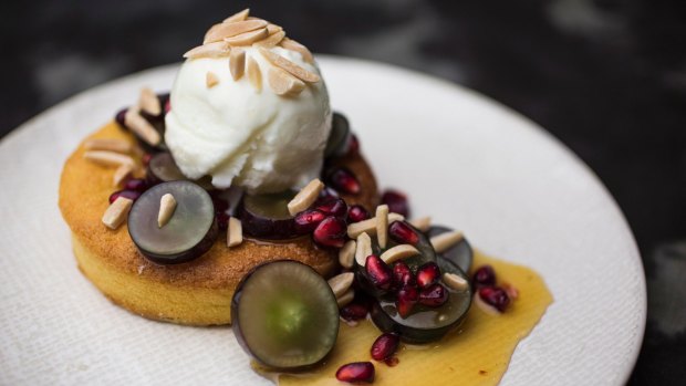 The flourless orange and almond cake with grapes, pomegranate and yoghurt sorbet. 
