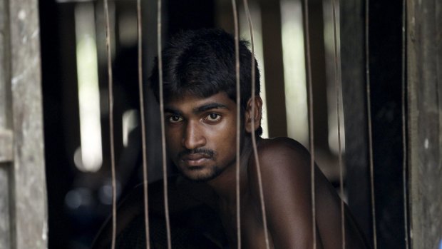 A refugee from Bangladesh, rescued by the Myanmar navy, at a Muslim religious school used as a temporary refugee camp in Myanmar.