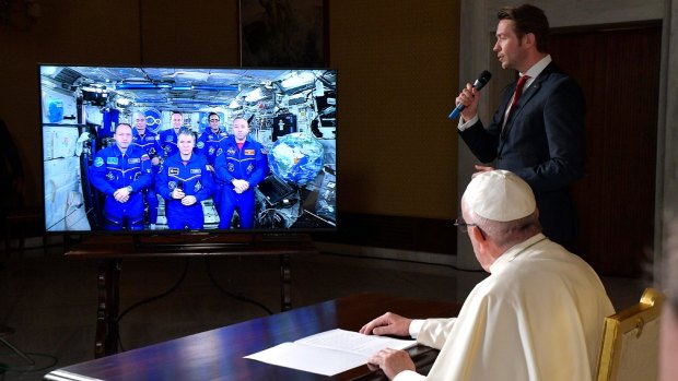 Pope Francis connects to the crew aboard the International Space Station from the Vatican on Thursday.