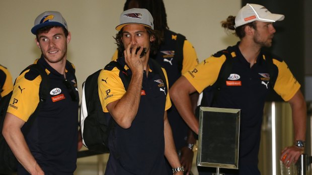 Eagles players at the airport en route to Melbourne for the grand final.
