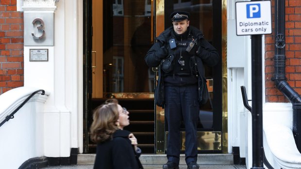A police officer guards the Ecuador embassy in London. 