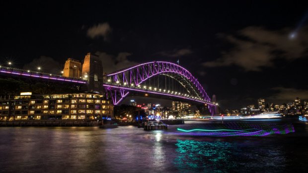 The Sydney Harbour Bridge lights up for Vivid