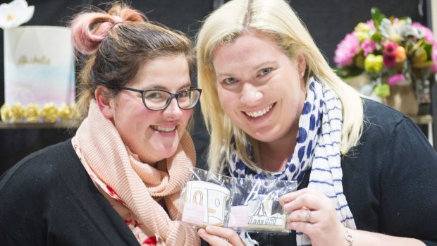Owners of Roseberry Street Bakery, Jade Sinkovits and Lisa Johnston with their Canberra icon cookies at the Handmade Market over the weekend.