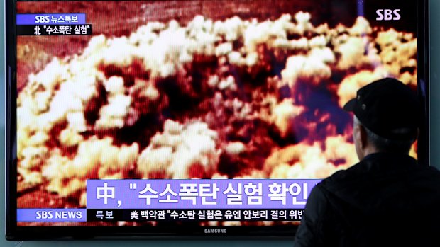 A television screen in Seoul shows a news broadcast about North Korea's nuclear test.