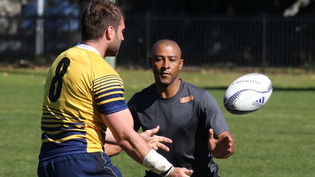 Former captain George Gregan gives some pointers at Wallabies training on Tuesday.