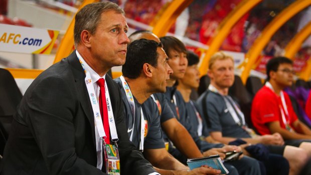 Wary: China coach Alain Perrin looks on during his side's victory over Uzbekistan at Suncorp Stadium.