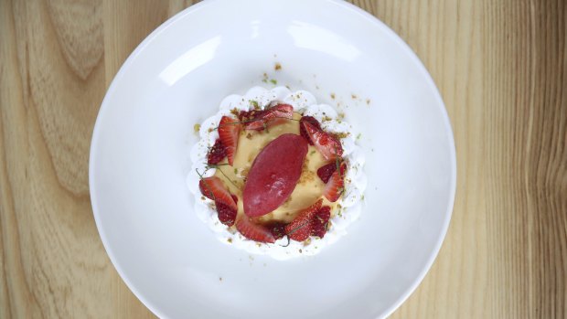 Yuzu lime curd with Italian meringue and raspberry sorbet.