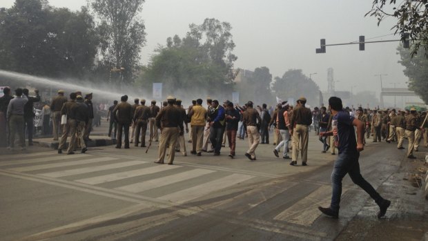 Police use water cannon to disperse protesters near Delhi University on Saturday. 
