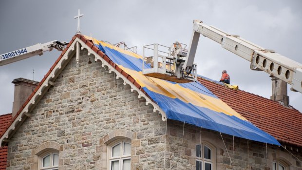 St Josephs College on Gregory Tce suffered heavy hail damage to its tiled roofs in November's storm.