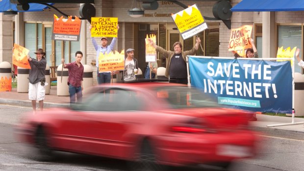 An "Occupy the FCC" rally protests the Federal Communications Commission's proposed changes to net neutrality regulations, in Washington in 2014. 