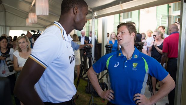 The long and short of it: West Indies and Australian captains Jason Holder and Steve Smith at the Prime Minister's reception on Friday.