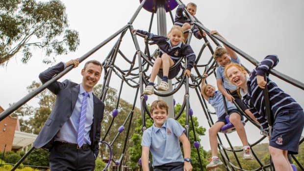 Canberra Grammar Principal Dr Justin Garrick (pictured with year 2 students) announced the school would be going co-educational.