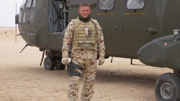 Veteran: Aaron Gray rode shotgun on top of an ASLAV in Iraq.