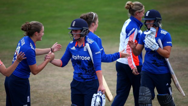 England celebrates after winning the first one-dayer of the Women's Ashes in Taunton.