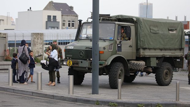 Brussels police say that they opened fire on a vehicle after a high-speed chase in the suburb of Molenbeek.