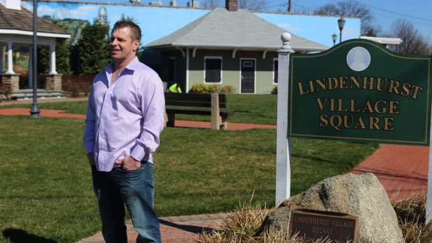 Michael Ferraro in the village square where he used to buy heroin. These days he attends an Alcoholics Anonymous meeting every morning.