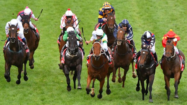 Dwayne Dunn riding Wise Hero (centre) defeats Ben E Thompson on Bord De Gain (second from right) and Craig Newitt on Katsuro (right) at Caulfield.