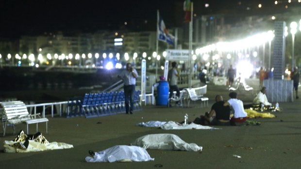 Bodies are seen on the ground after at least 84 people were killed in Nice.