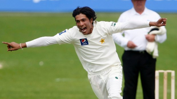 Tainted talent: Pakistan's Mohammad Amir celebrates after taking the wicket of Australia's Mitchell Johnson during the 1st day of the second Test at Headingley on July 21, 2010.