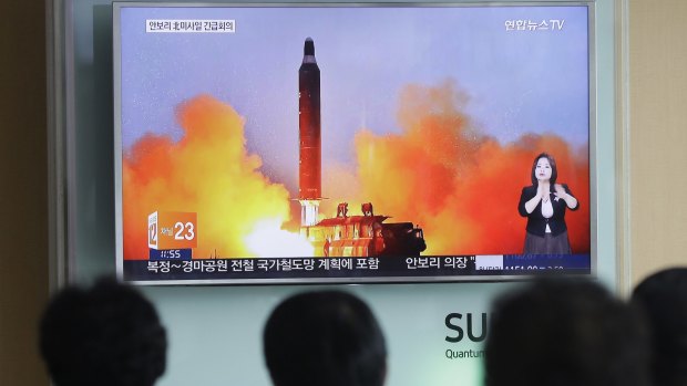 TV news showing North Korea's ballistic missile launch. 