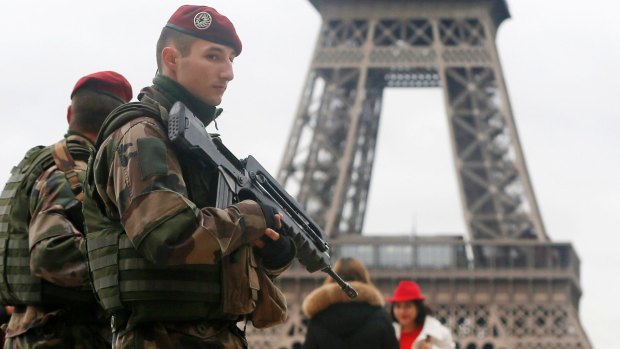 French soldiers at the Eiffel Tower after the Paris shootings.