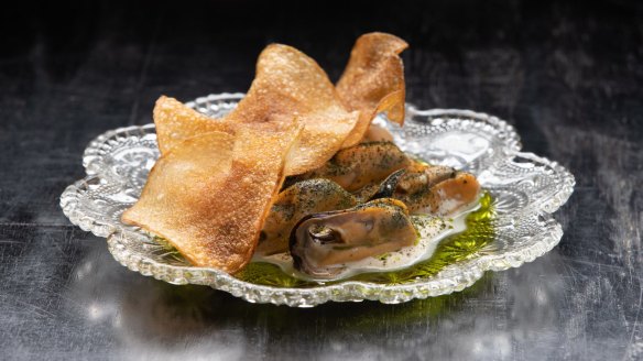 Bar snack perfection: Pickled mussels with whipped cod roe and house-made potato crisps.