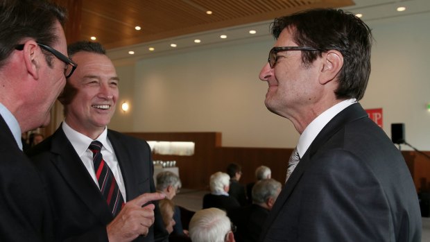 Mr Combet (right) catchs up with another former Labor Minister Craig Emerson at the launch.