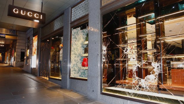 Sledgehammers were used to break into the Gucci store on Collins Street. 