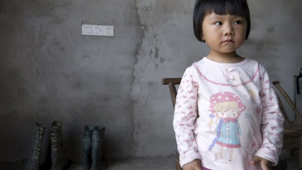 Two-year-old Xu Yilin. A lawsuit filed by residents of her town claim a chemical plant is responsible for high levels of lead in the blood of their children.