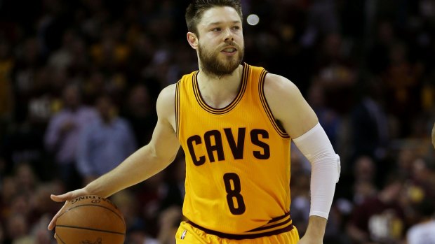 Matthew Dellavedova #8 of the Cleveland Cavaliers controls the ball against the Golden State Warriors during Game three of the NBA finals.