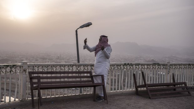 A Saudi man records a video message in Hail.