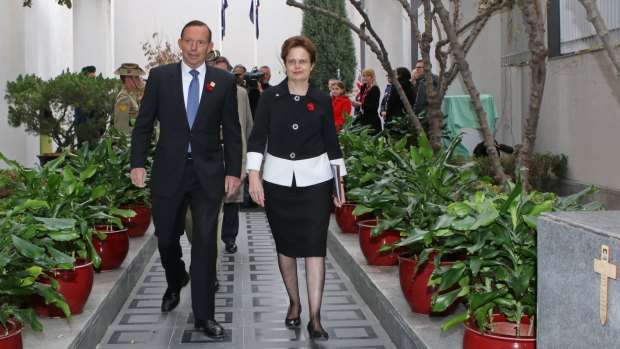 Frances Adamson with then Prime Minister Tony Abbott at a Remembrance Day event held at the Australian Embassy in Beijing in 2014.
