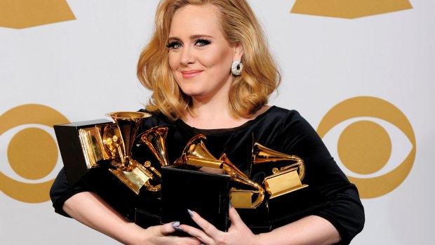 Adele with her six gongs at the 2012 Grammy Awards.