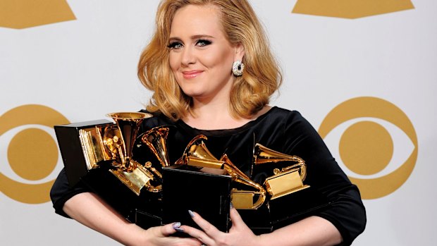 Adele with her six gongs at the 2012 Grammy Awards.