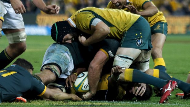 The moment: Wallabies centre Tevita Kuridrani scores a try to win the game in the last minute of their Rugby Championship match against South Africa's Springboks in Brisbane.